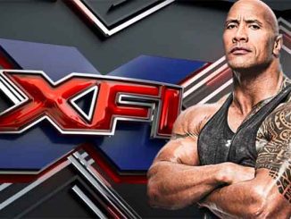 the Rock posing in front of XFL logo