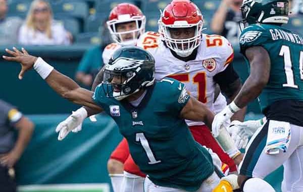 Philadelphia Eagles QB Jalen Hurts avoiding a sack from the Kansas City Chiefs defense