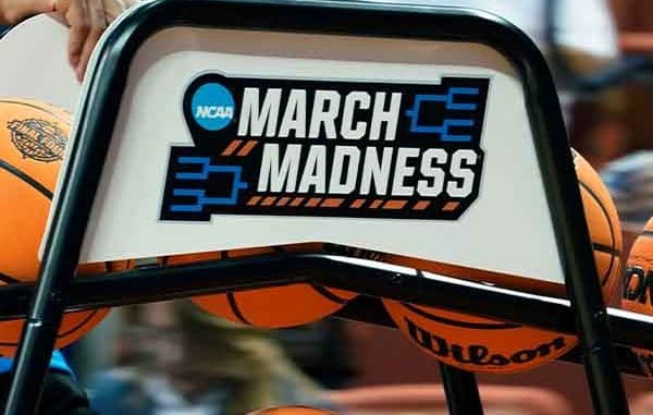 a metal chair with a March Madness logo on the back