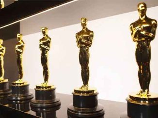 a row of Academy Awards