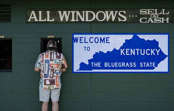a man placing a bet at a sportsbook window next to a Welcome to Kentucky sign