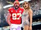 Travis Kelce and Taylor Swift at a crowded NFL Stadium