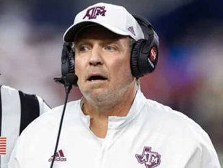 former Texas A&M head coach Jimbo Fisher looking worried