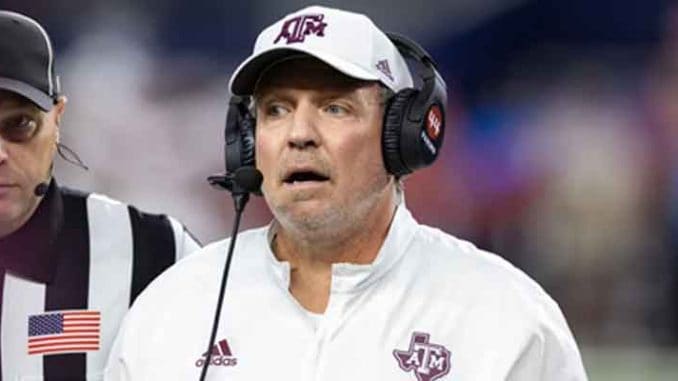 former Texas A&M head coach Jimbo Fisher looking worried