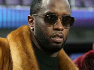 Diddy in shades and a fur coat