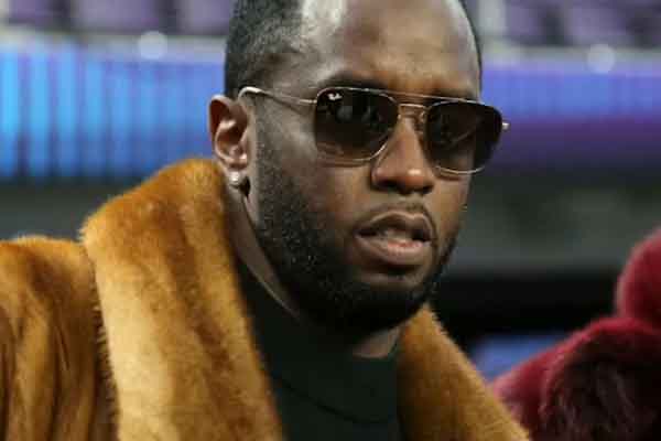 Diddy in shades and a fur coat