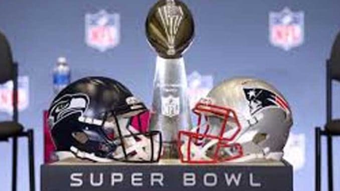 Super Bowl helmets and trophy